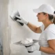 How Professionals Skim Coat Drywall Walls